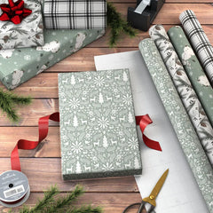 Through the Woods 4-Pack Assorted Holiday Wrapping Paper Roll Bundle, 100 sq. ft. total